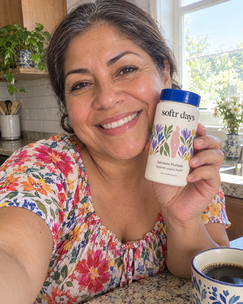 A woman in her fifties smiling with softr days